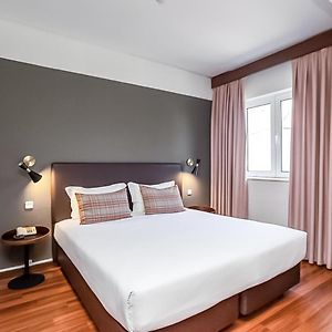 Familie Kamer met een King Size Bed